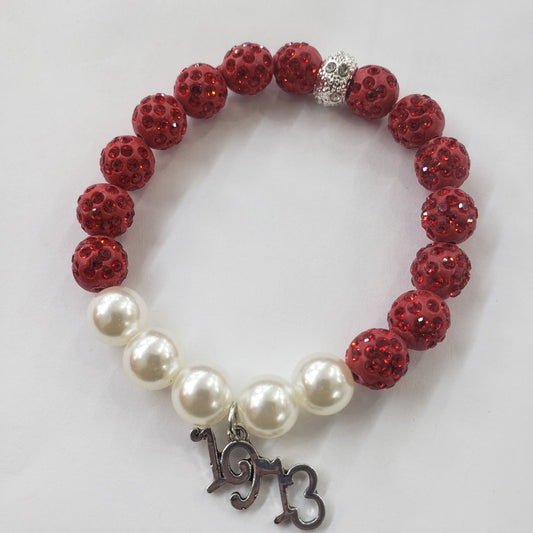 DST  BLING PEARL BRACELET W/ 1913 CHARM